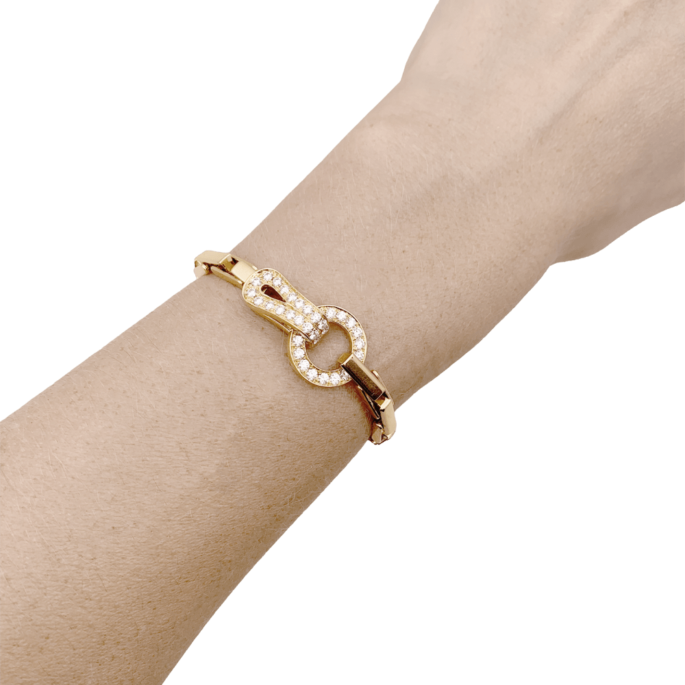 Bracelet Cartier, "Agrafe", or jaune, diamants. 6