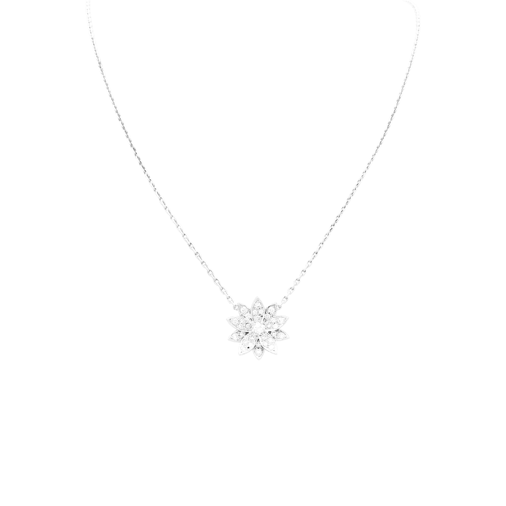 Pendentif Van Cleef & Arpels, "Lotus", or blanc et diamants.  1