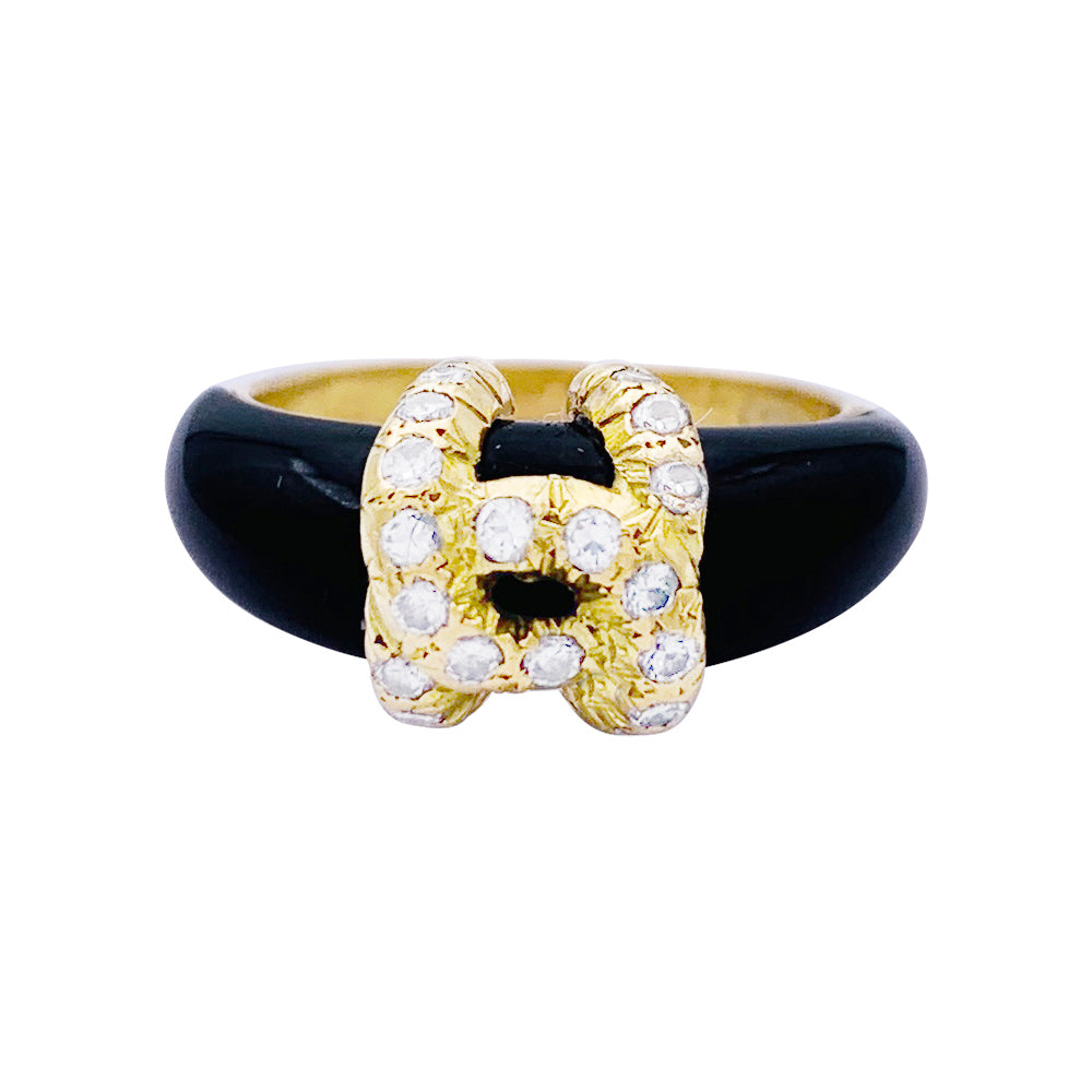 Bague Cartier, "Double C", or jaune, onyx, diamants. 2