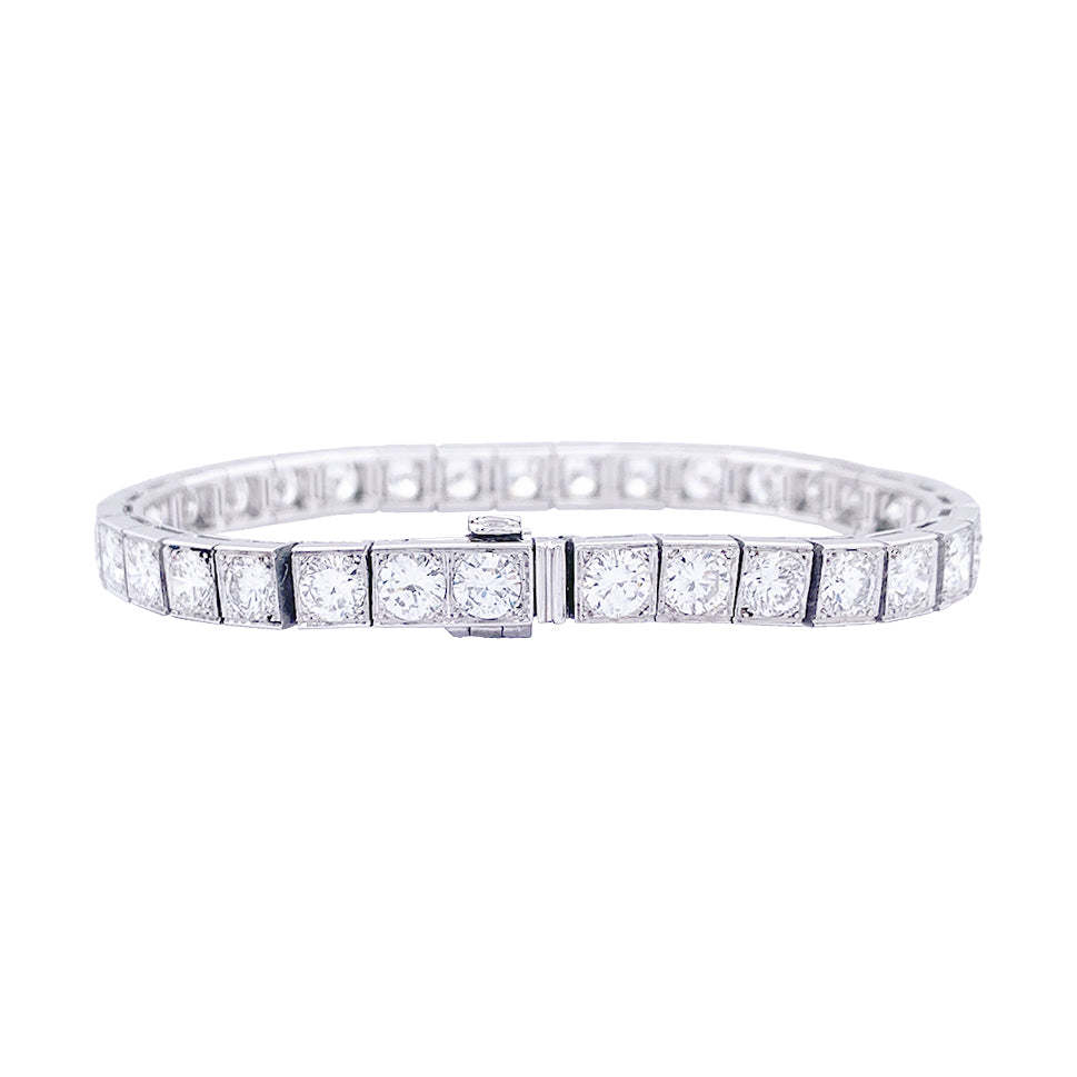 Bracelet ligne or blanc, platine, diamants. 1