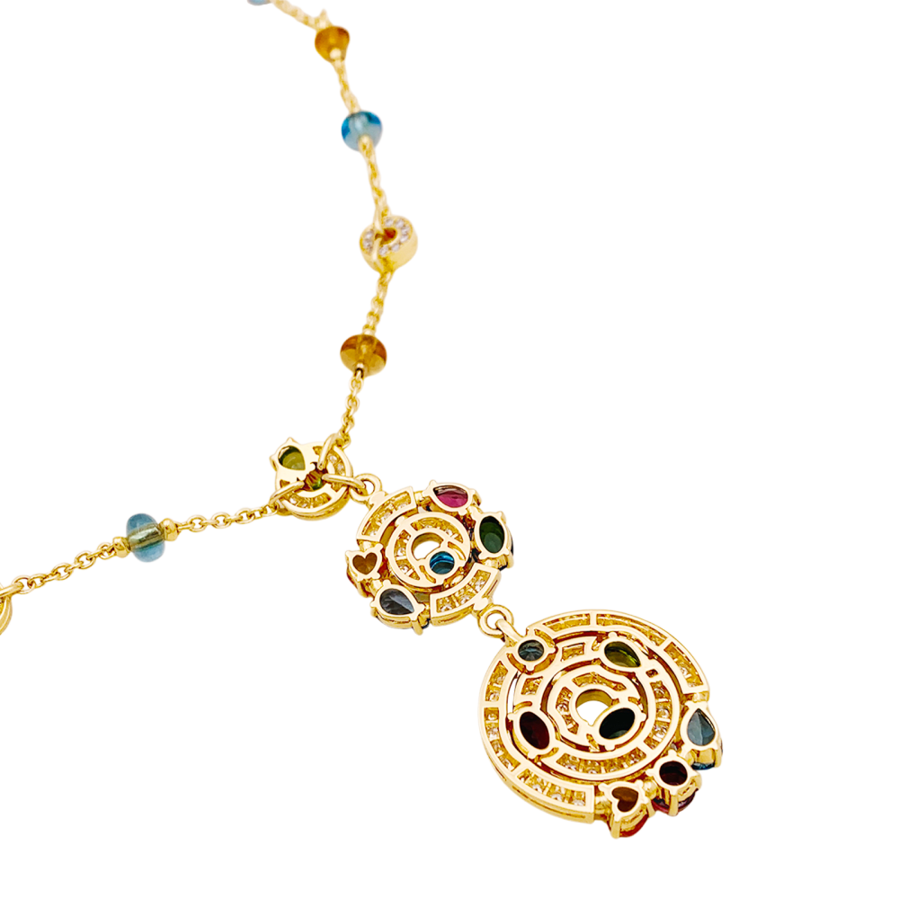 Collier BULGARI "Astrale", or jaune, diamants et pierres de couleur. 5