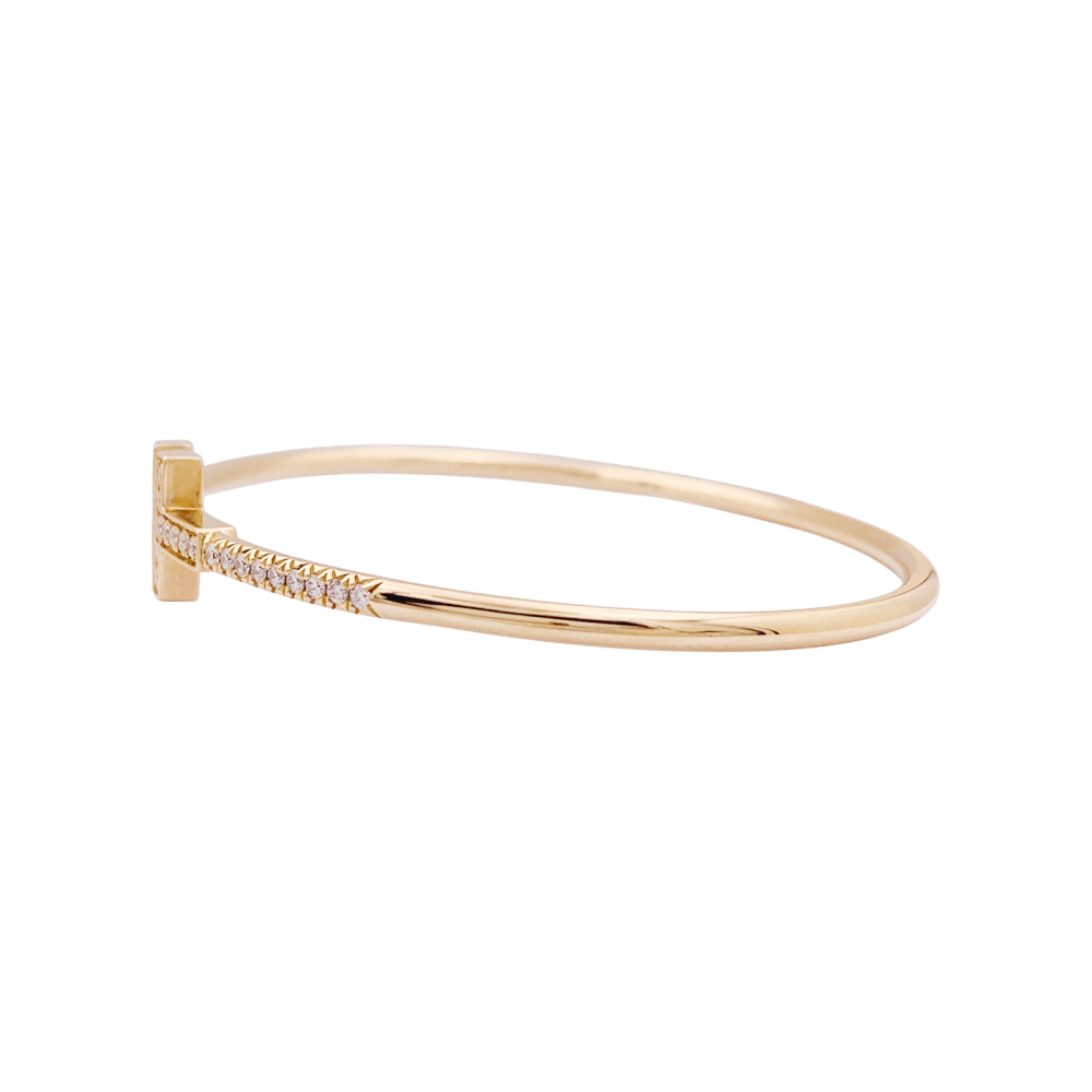 Bracelet Tiffany "Wire Tiffany T" en or rose et diamants. 3