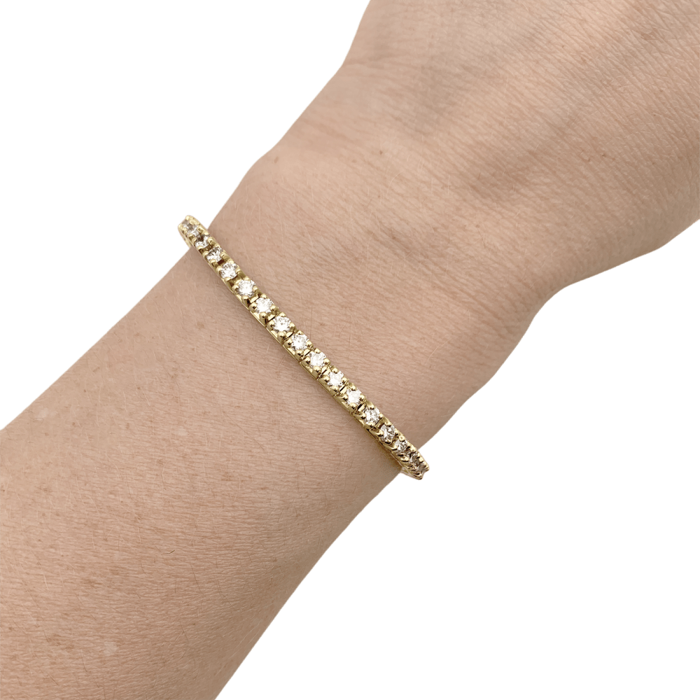 Bracelet ligne or jaune et diamants. 6