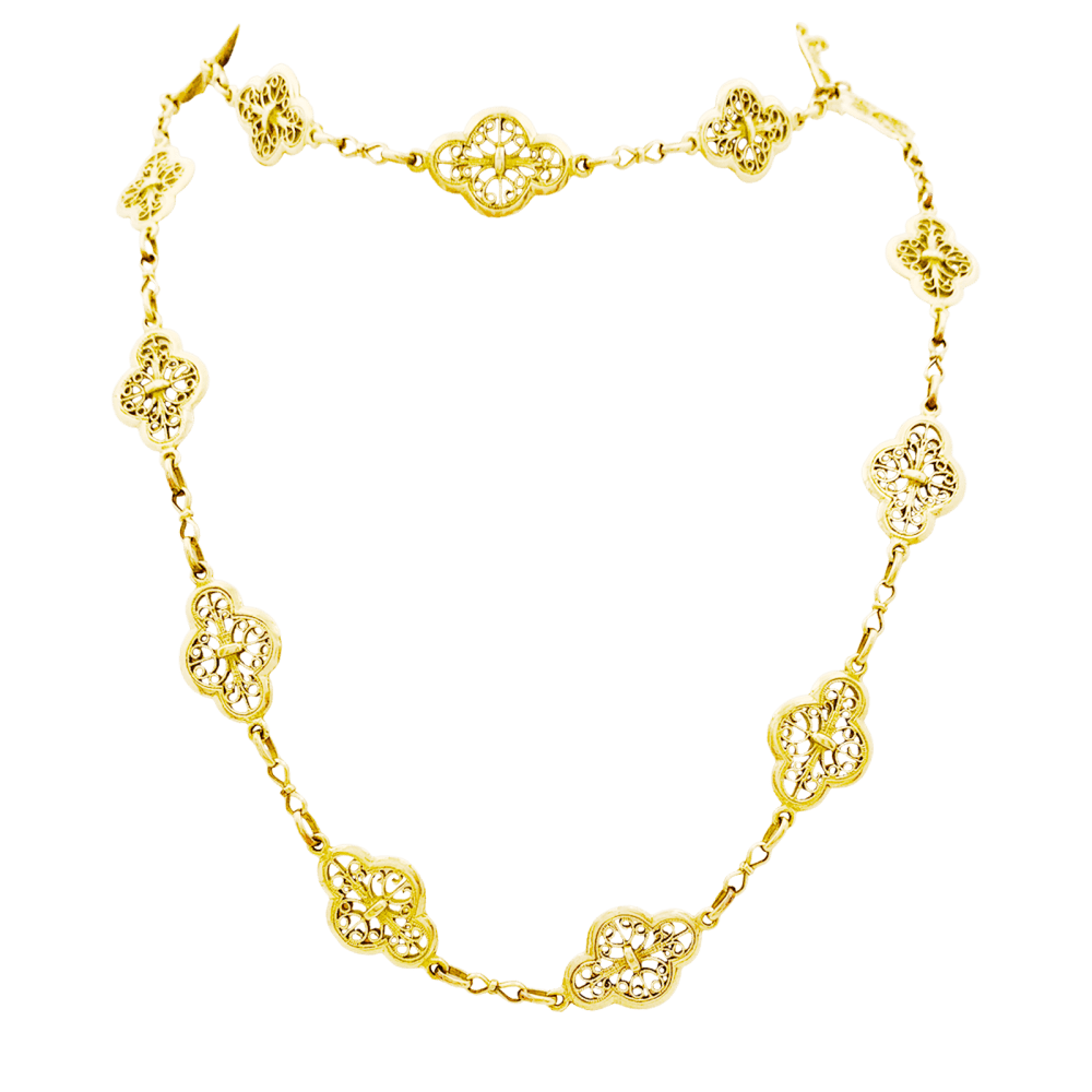 Sautoir motifs filigranés en or jaune. 4