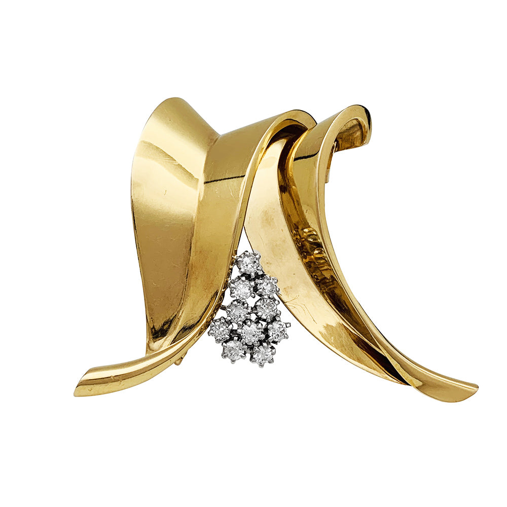 Broche Fontana en or jaune 750/000 et platine 950/000 sertie de 10 diamants taille ancienne. Poids brut : 11,4 grammes. 1