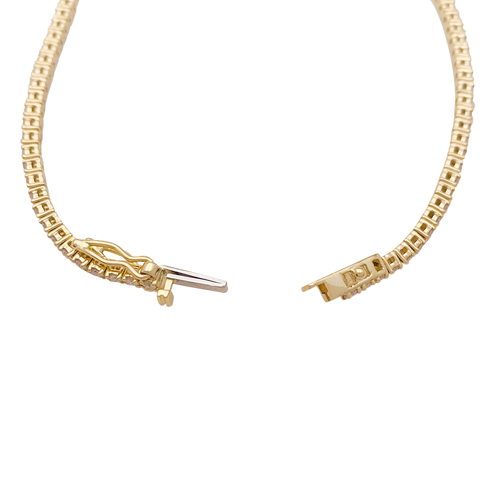 Bracelet ligne tennis or jaune, diamants. 1