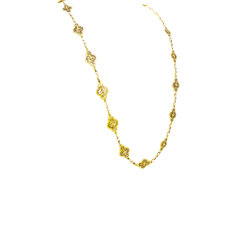 Sautoir motifs filigranés en or jaune. 2