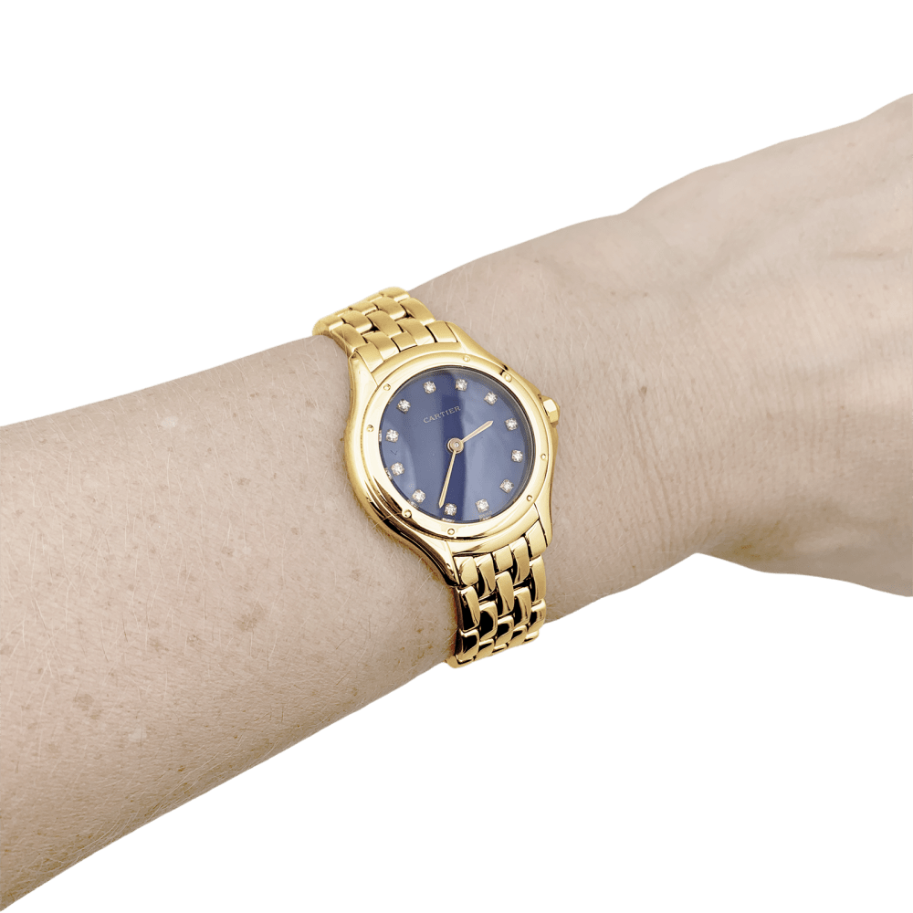 Montre Femme CARTIER, "Cougar", or jaune, index diamants. 7