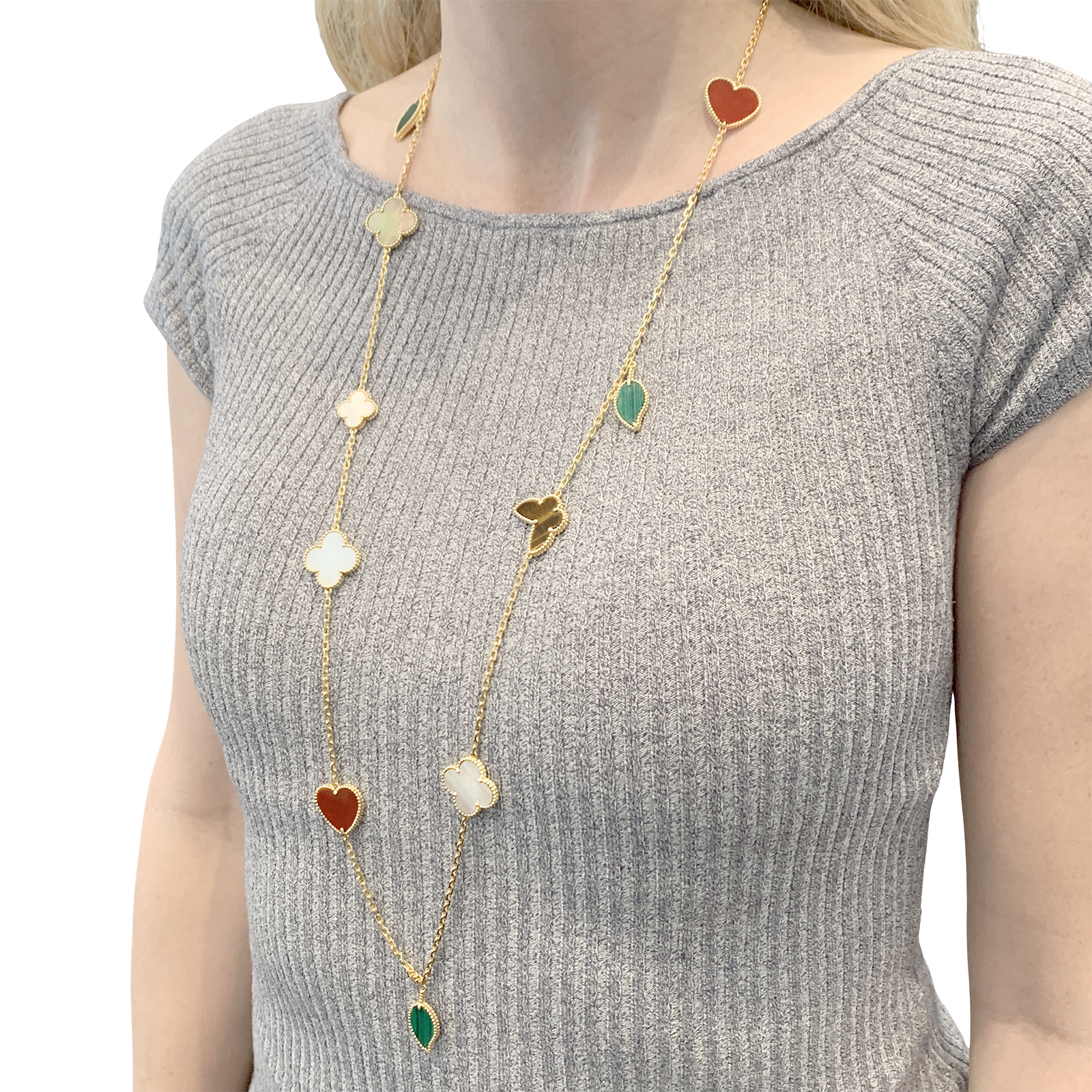 Collier-Sautoir Van Cleef & Arpels, "Lucky Alhambra", or jaune, cornaline, malachite, oeil de tigre, nacre. 7