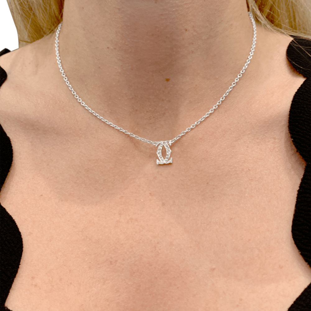 Collier Cartier, "Double C", or blanc et diamants. 5