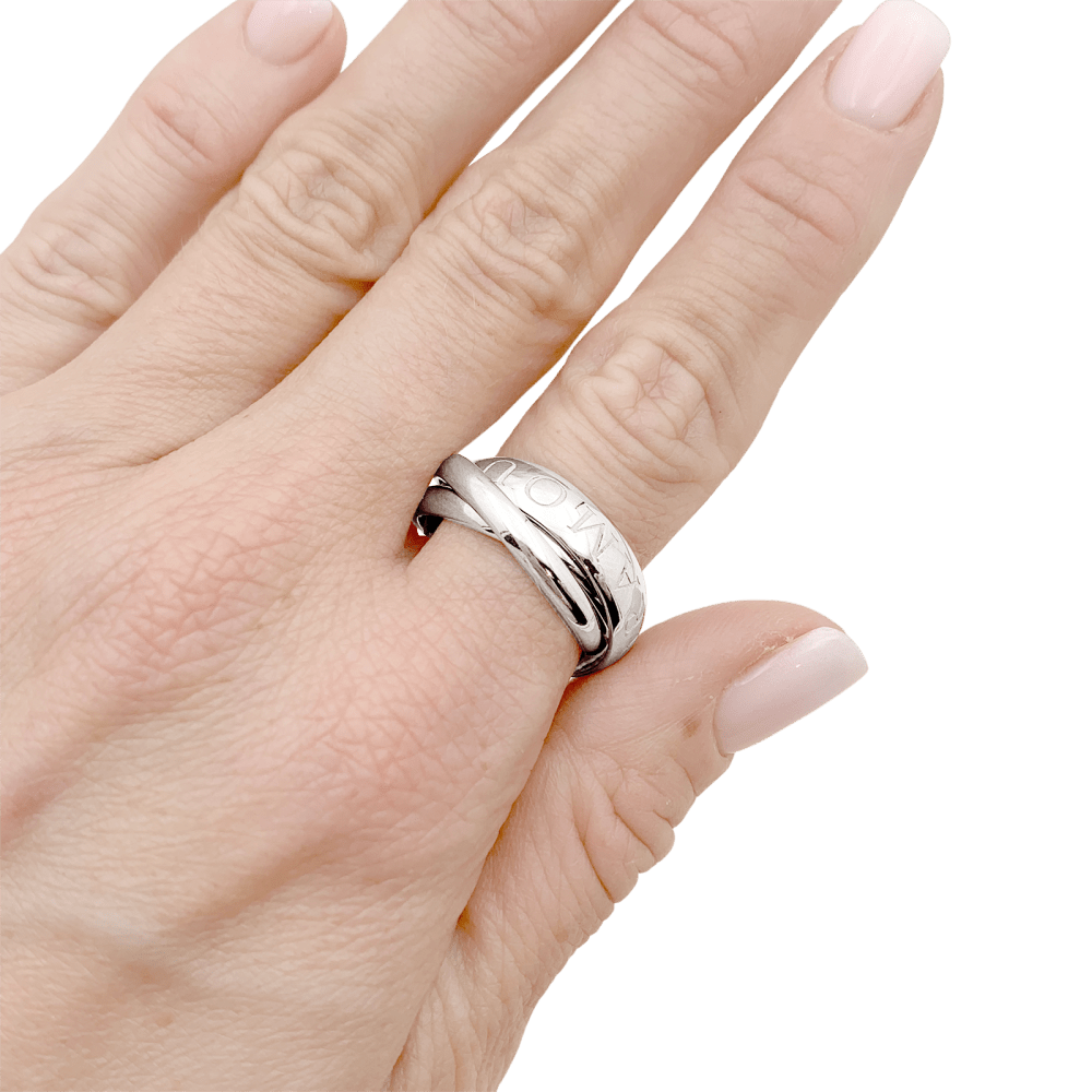 Bague CARTIER "Trinity", or blanc. 5