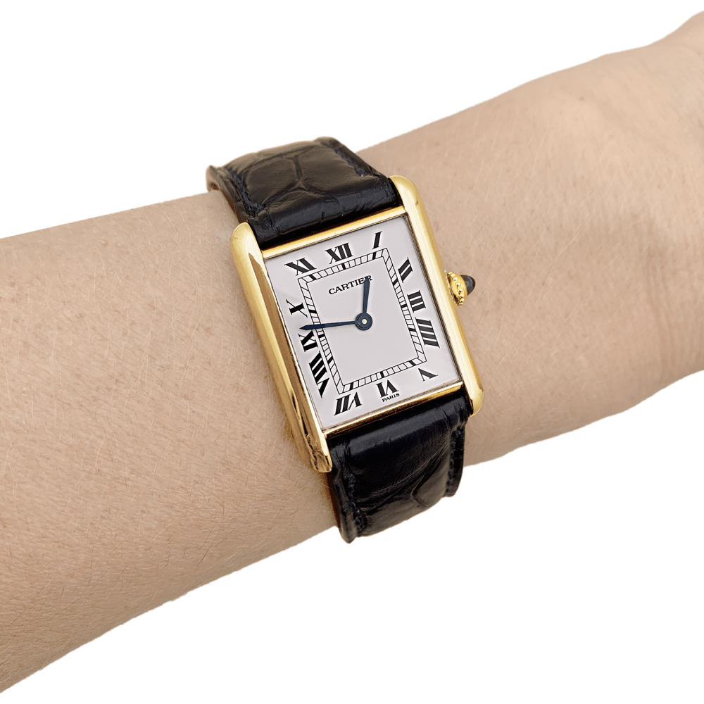 Montre Cartier, "Tank Louis Cartier", or jaune, bracelet cuir. 6