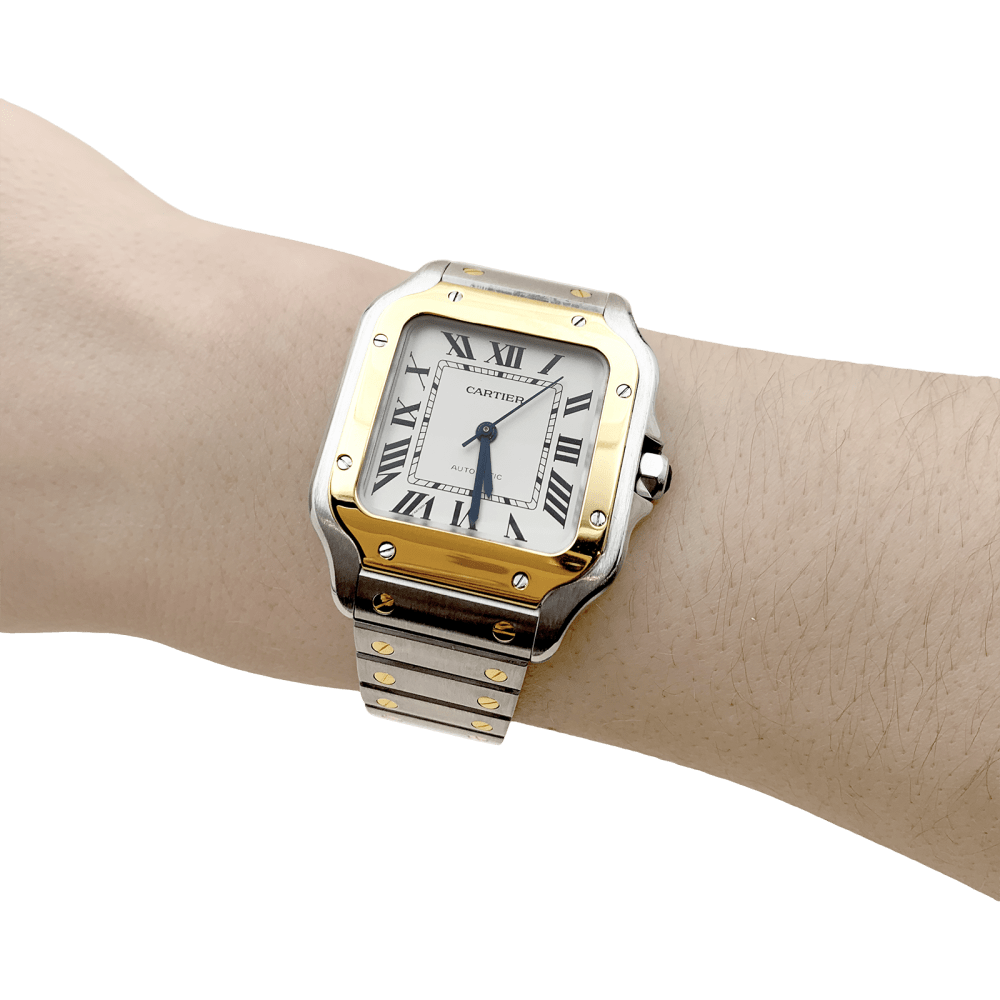Montre Cartier, "Santos", acier et or. 7