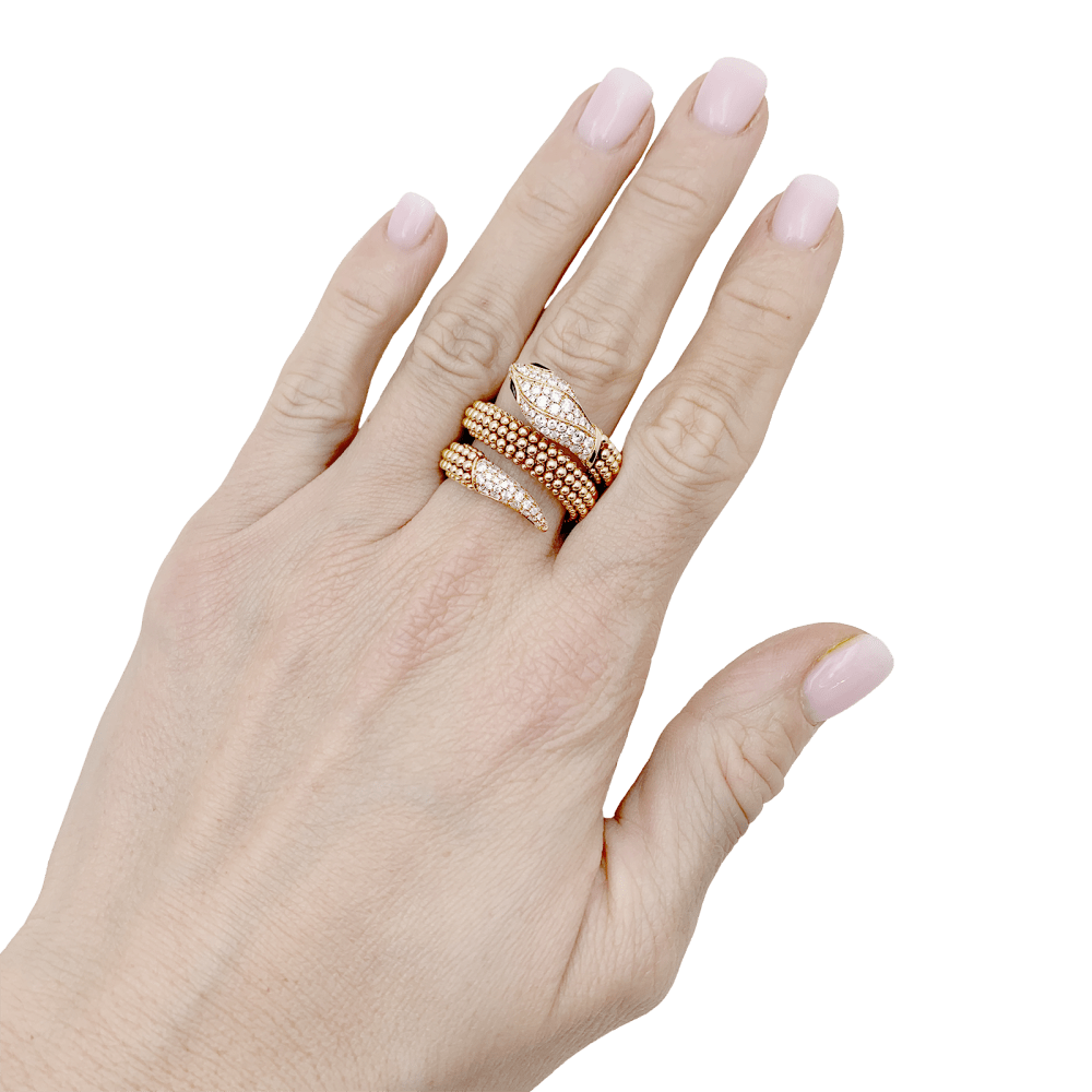 Bague Bulgari, "Serpenti" or rose, diamants et onyx. 8
