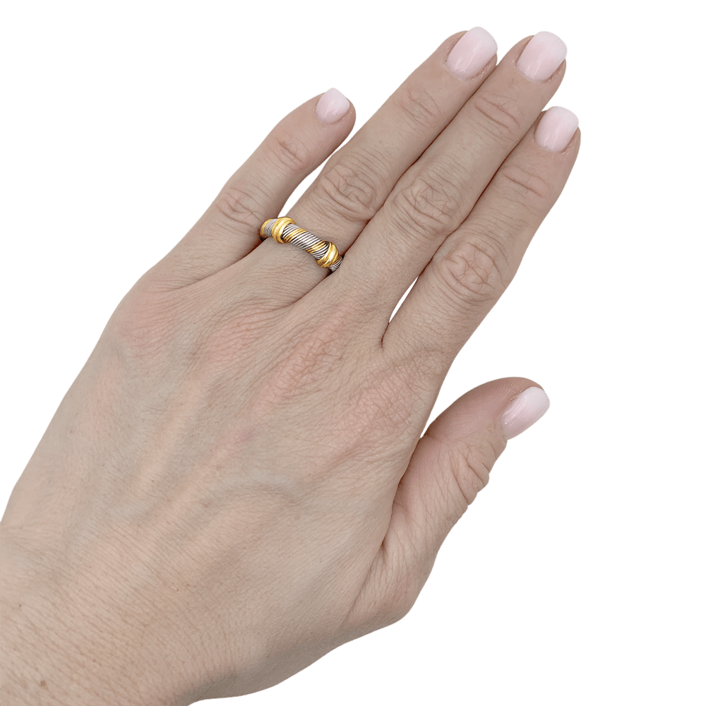 Bague Cartier, "Trinity", trois tons d'or et acier. 6
