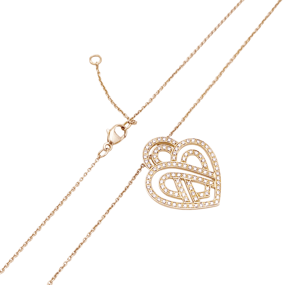 Collier Poiray, "Coeur entrelacé", or rose et diamants. 4