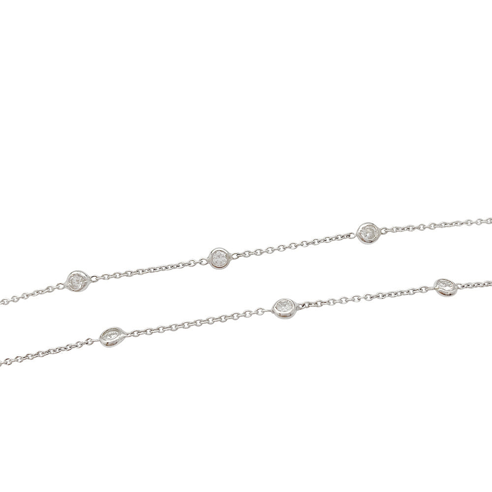 Collier gouttière en or blanc, diamants. 1