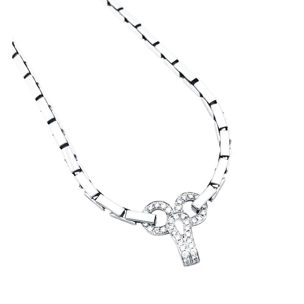 Collier Cartier "Agrafe" en or blanc et diamants. 4