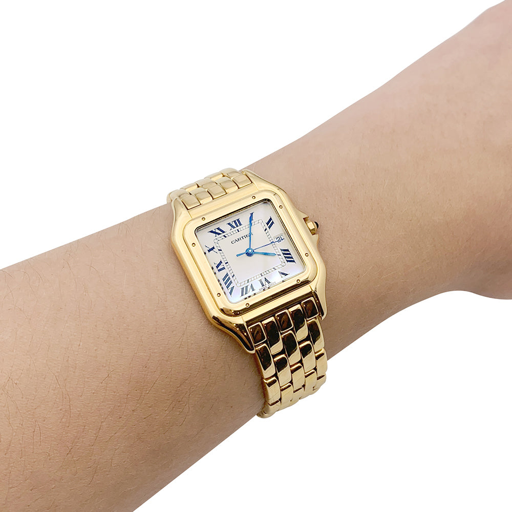 Montre Cartier "Panthère" en or jaune sur or jaune. 5