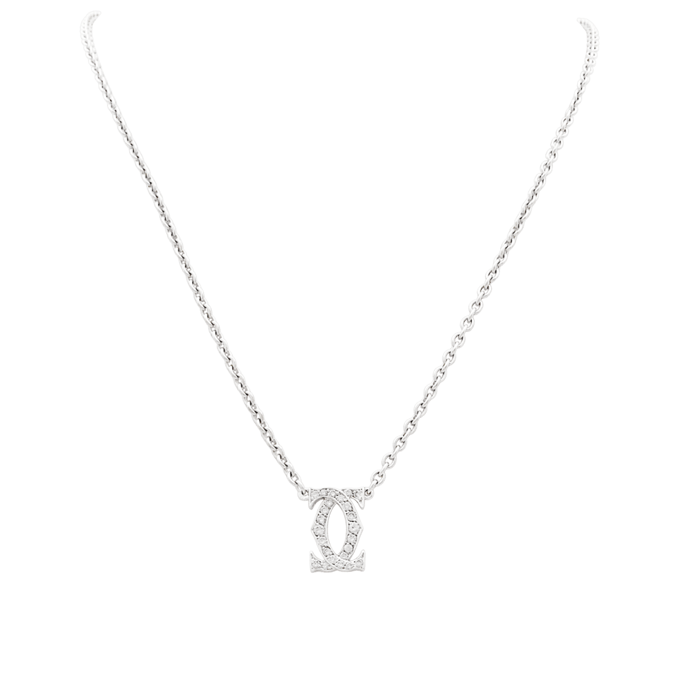 Collier Cartier, "Double C", or blanc et diamants. 1