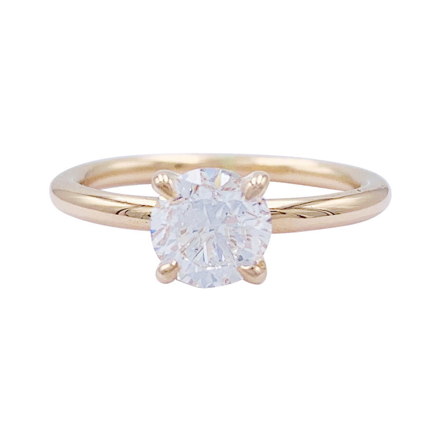 Bague solitaire en or rose, diamant 1 carat. 1