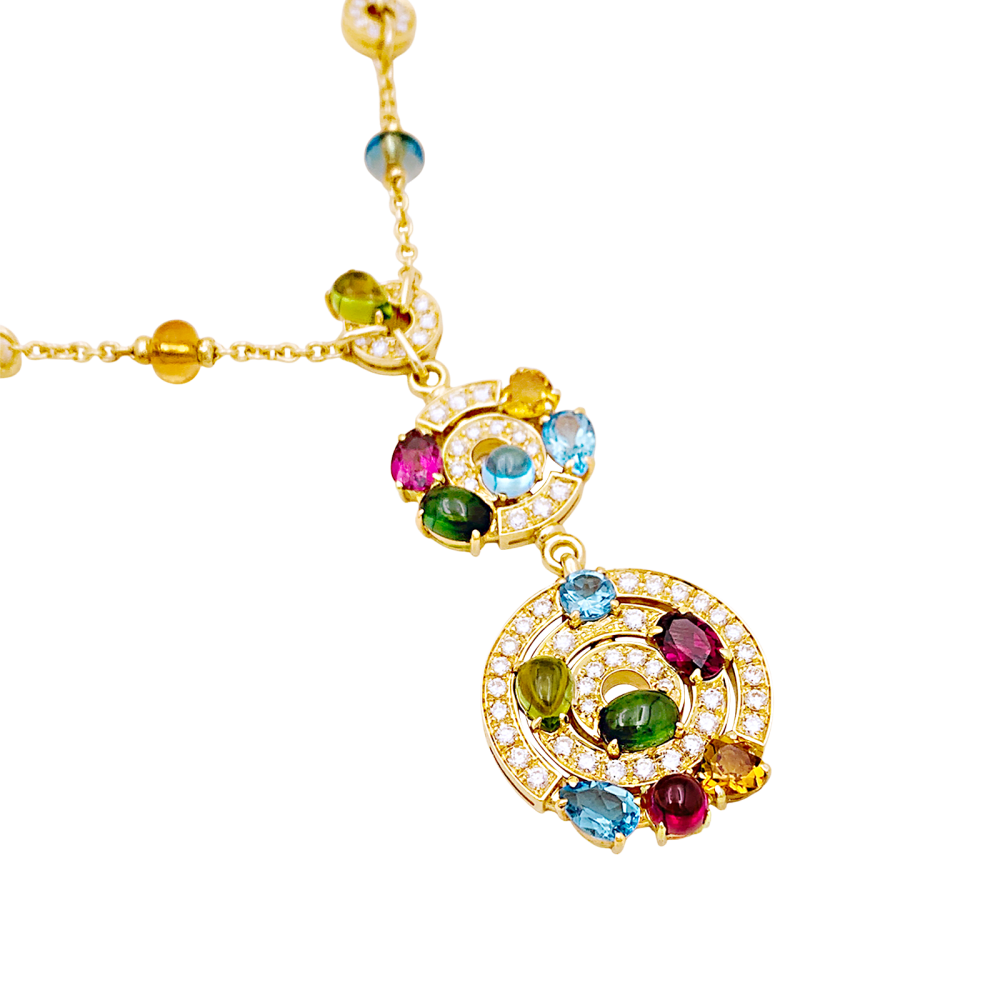 Collier BULGARI "Astrale", or jaune, diamants et pierres de couleur. 4