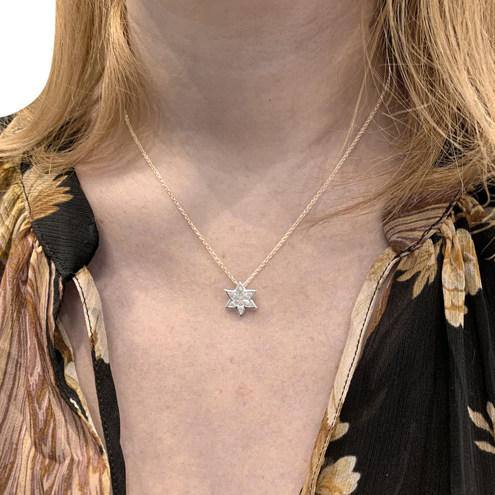 Pendentif en or blanc, étoile diamants. 5