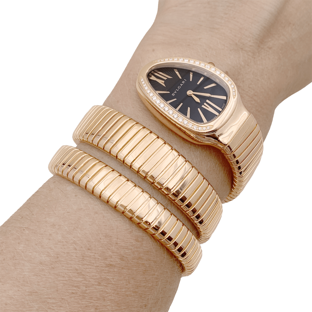 Montre Bulgari, “Serpenti Tubogas”, or rose, diamants. 7