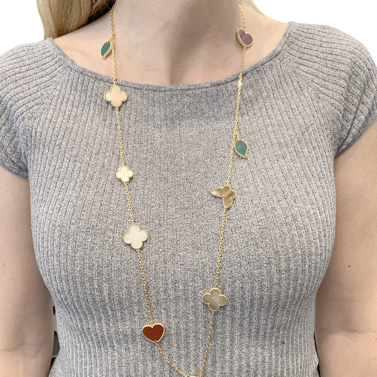 Collier-Sautoir Van Cleef & Arpels, "Lucky Alhambra", or jaune, cornaline, malachite, oeil de tigre, nacre. 6