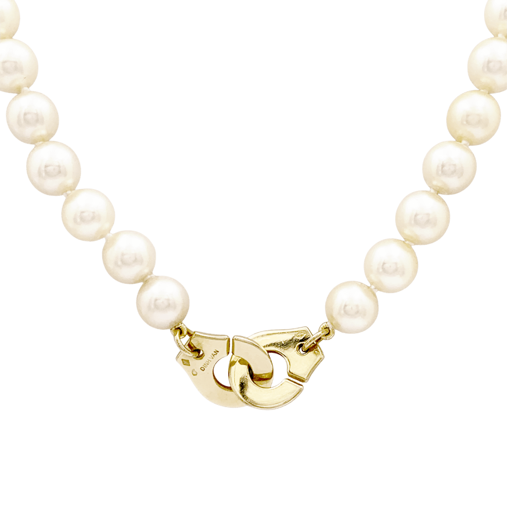 Collier de perles Dinh Van, "Menottes R12", en or jaune. 2