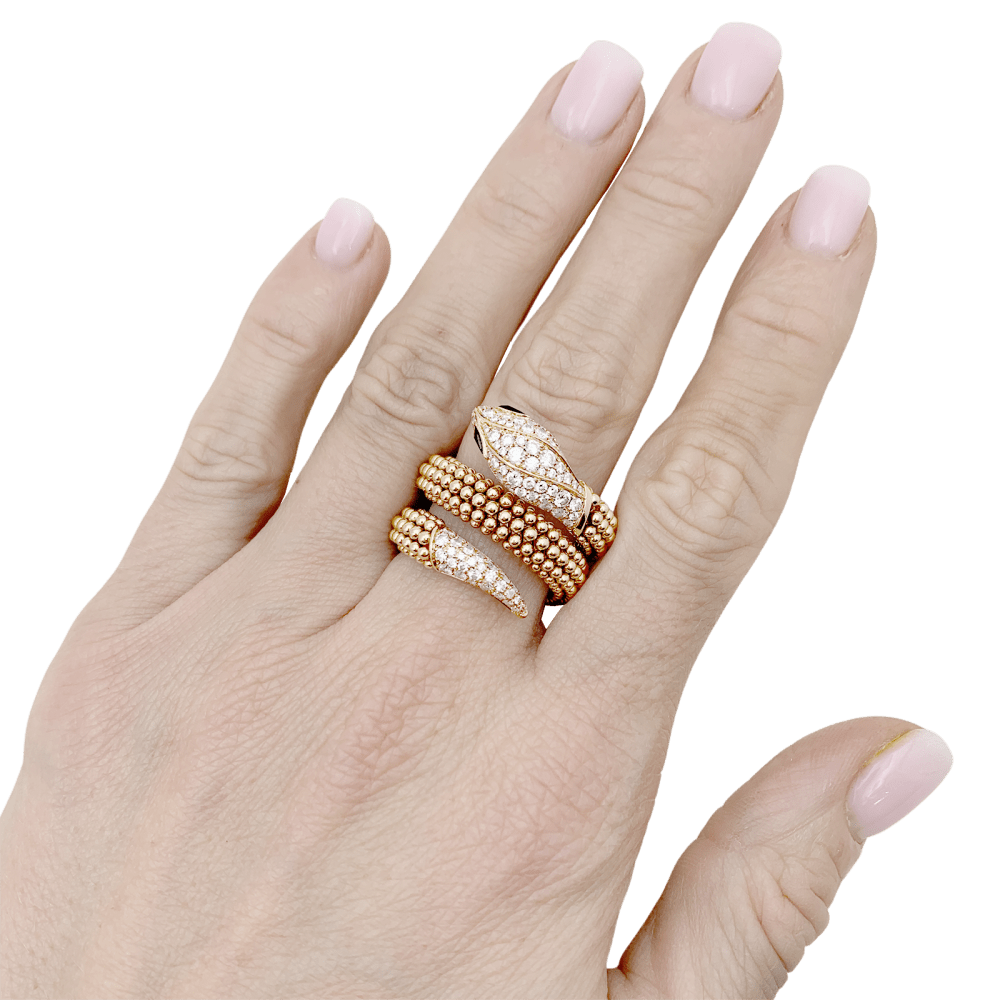 Bague Bulgari, "Serpenti" or rose, diamants et onyx. 9
