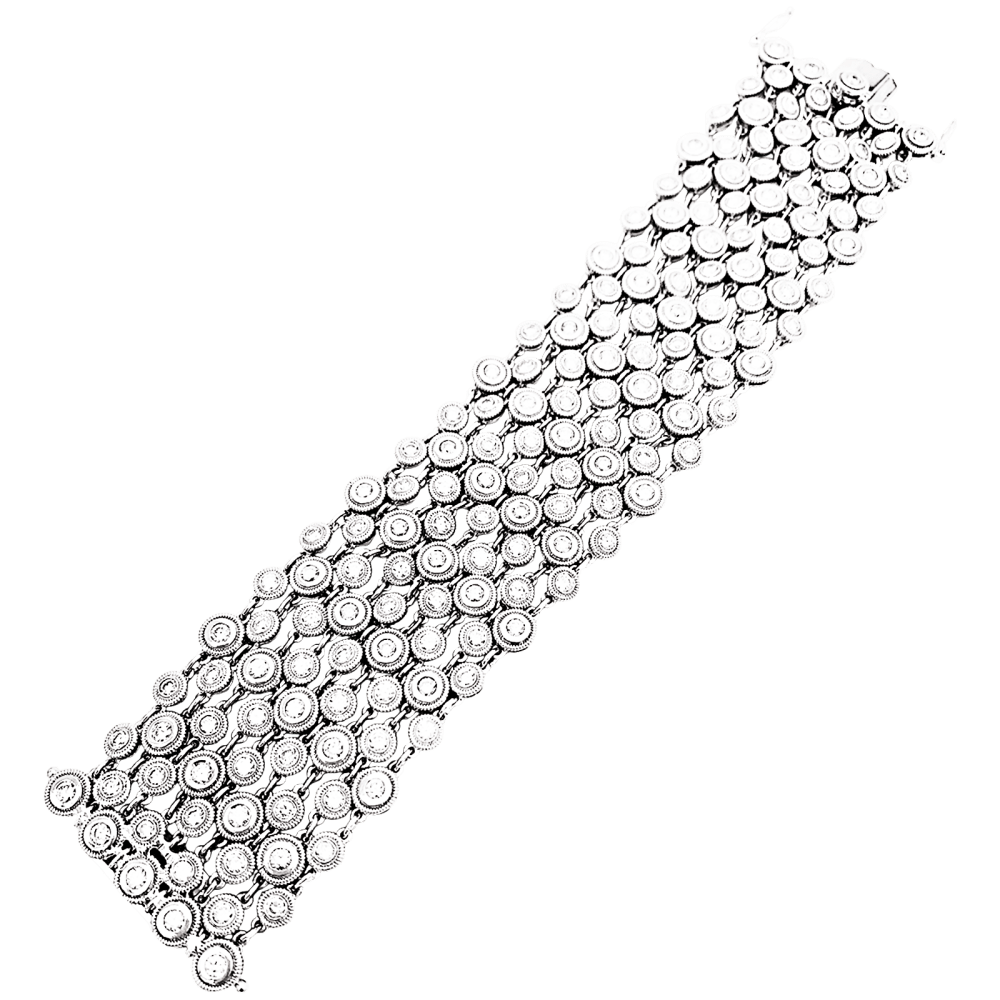 Bracelet souple, or blanc et diamants. 2