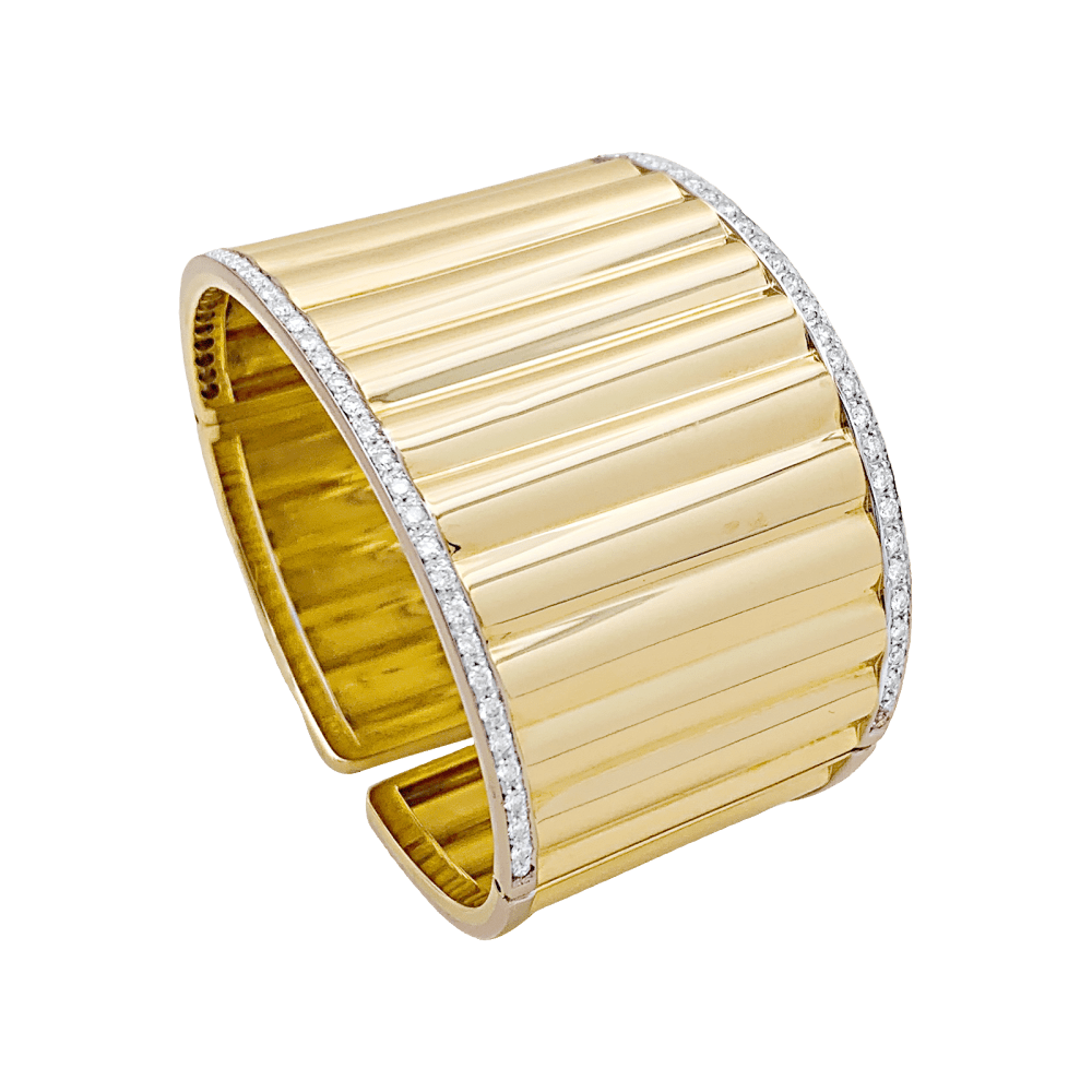 Bracelet manchette deux ors et diamants. 1