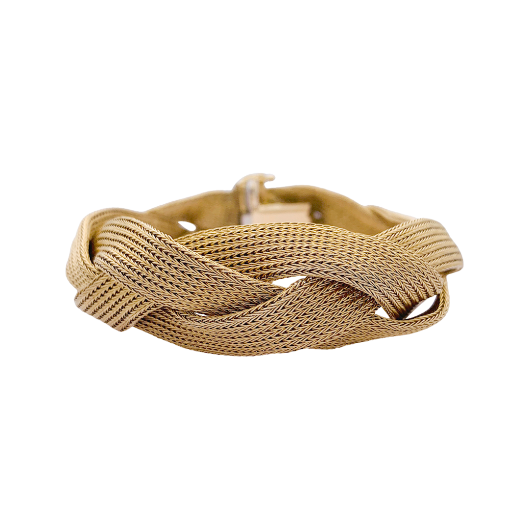 Yellow gold braided bracelet.