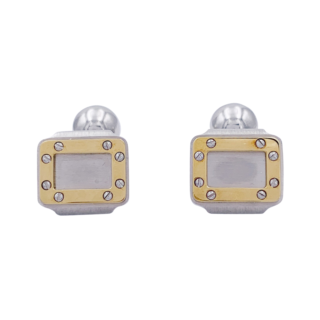 Boutons de manchette Cartier, "Santos Dumont", or et acier.