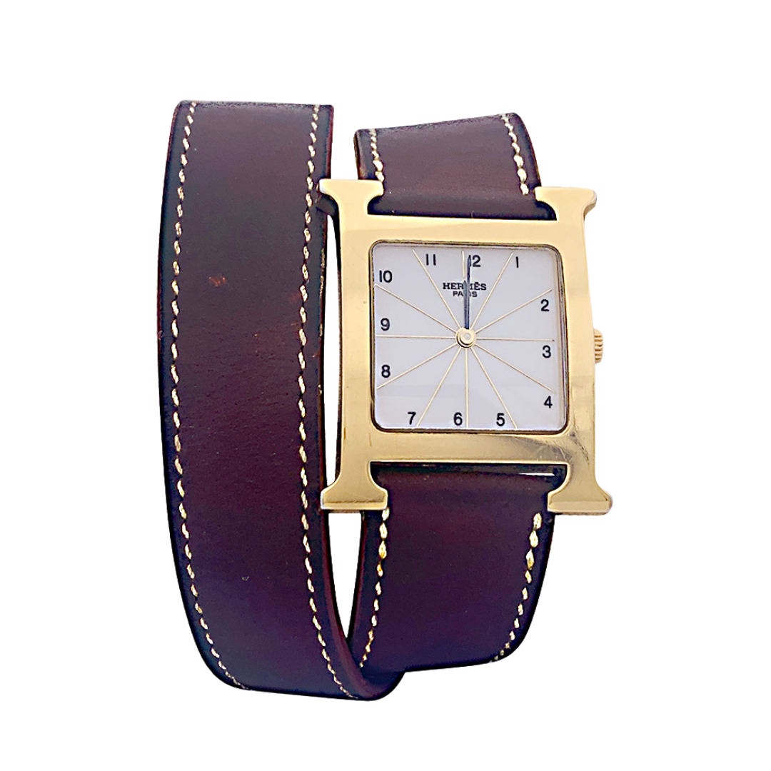 Montre Hermès,"Heure H", plaqué or, acier sur cuir.