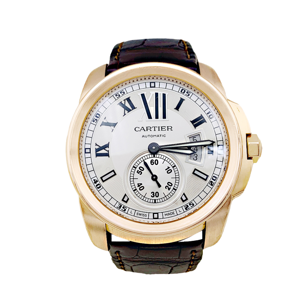 Montre Cartier, "Calibre de Cartier", or rose, cuir.