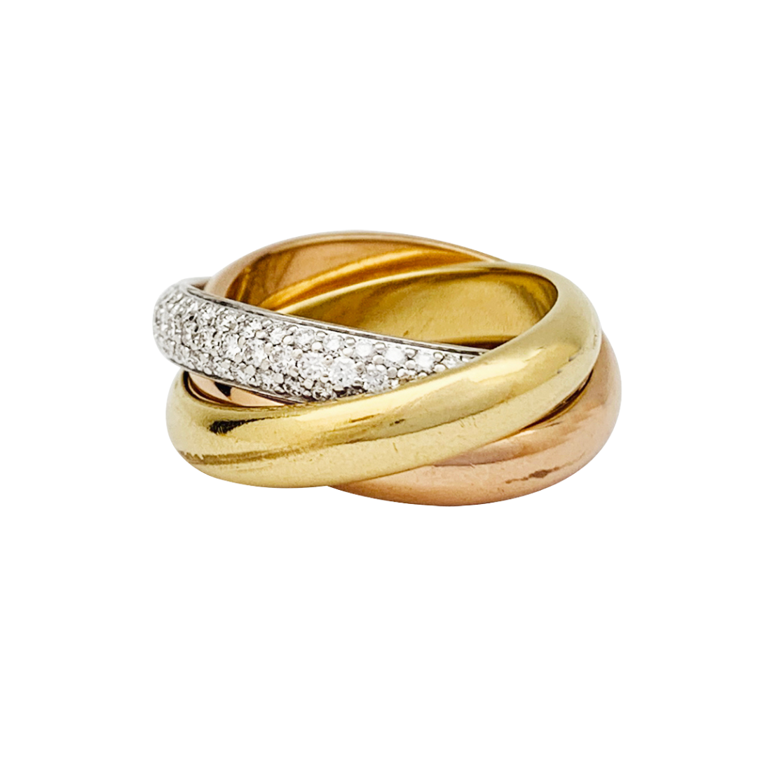 Anillo Cartier, clásico “Trinity”, 3 oros, diamantes.