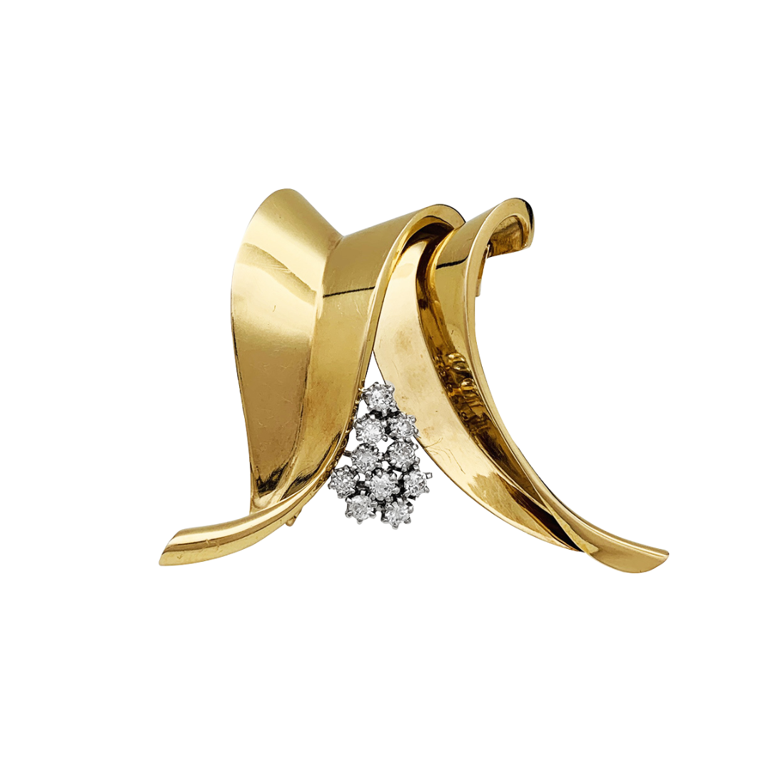 Broche Fontana en oro amarillo 750/000 y platino 950/000, engastado con 10 diamantes talla antigua. Peso bruto: 11,4 gramos.