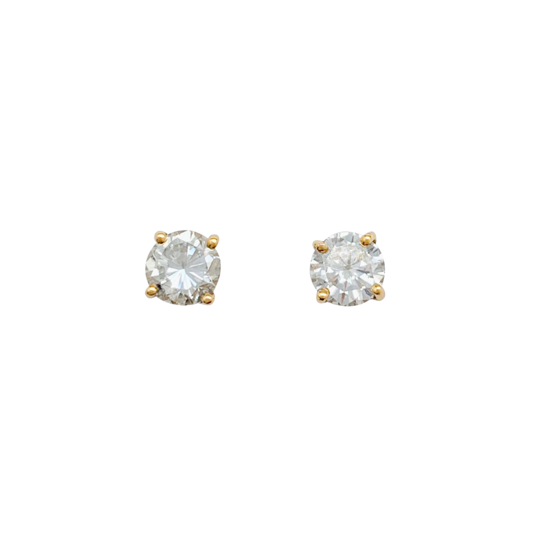 Pre-owned 18K yellow gold and 0.20 carat diamond stud earrings