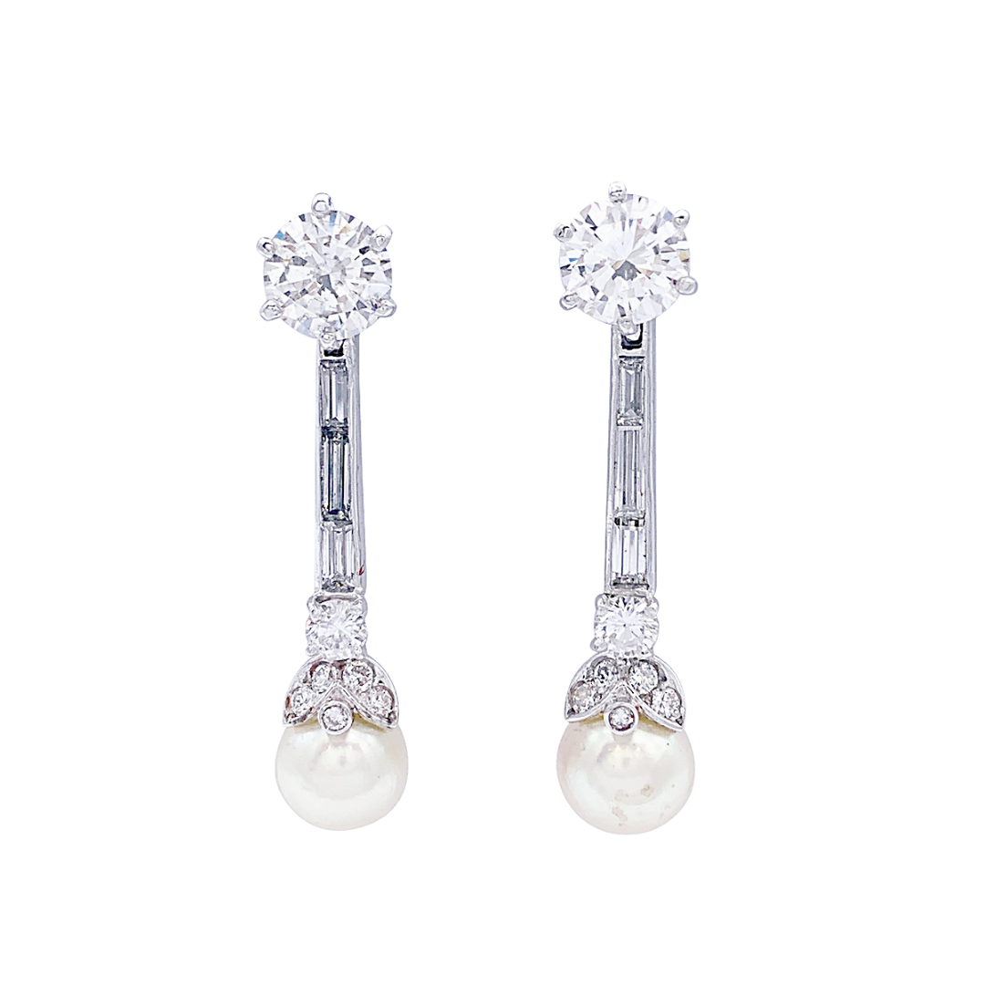 Pendientes colgantes de oro blanco, platino, perla y diamantes.