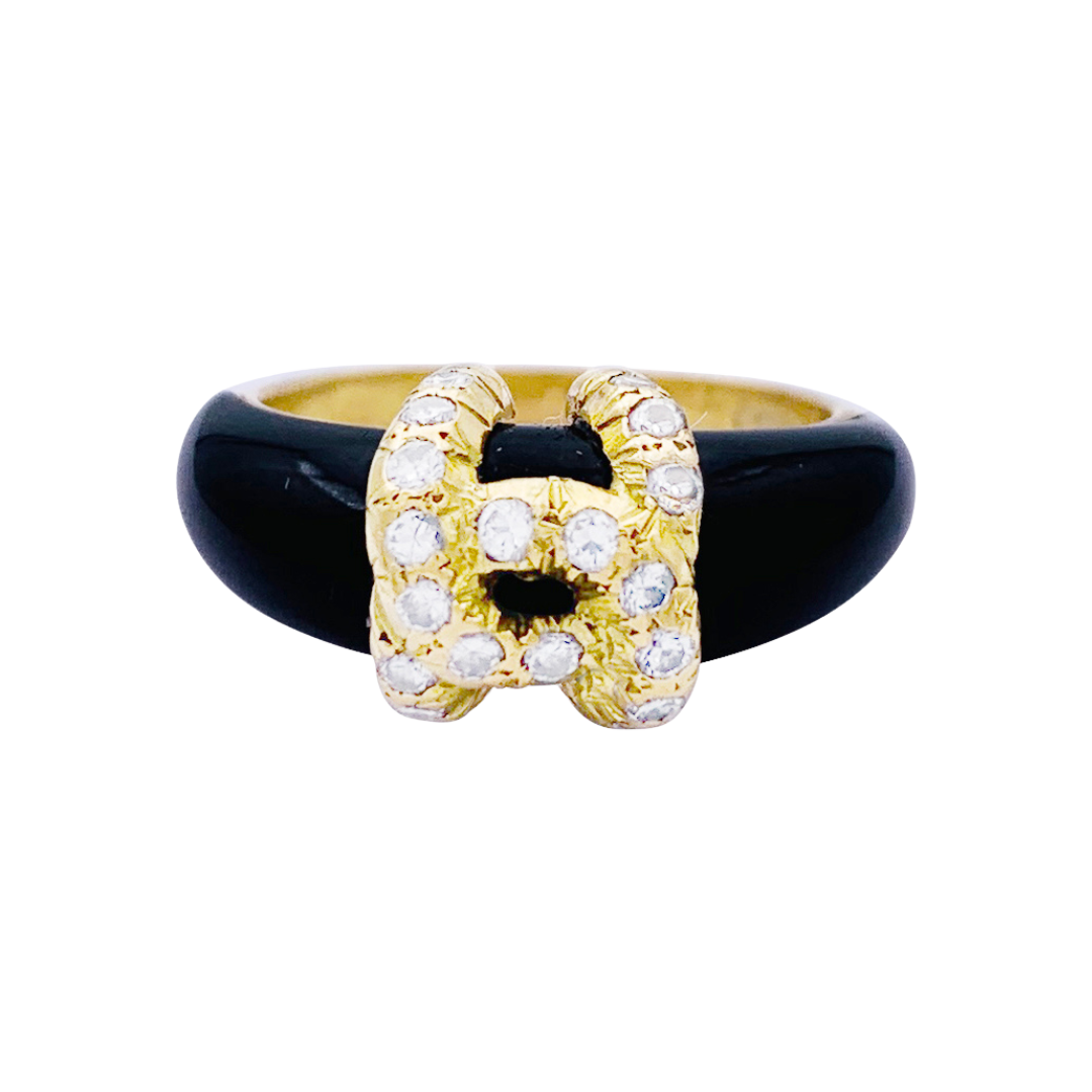 Cartier ring, "Double C", yellow gold, onyx, diamonds.