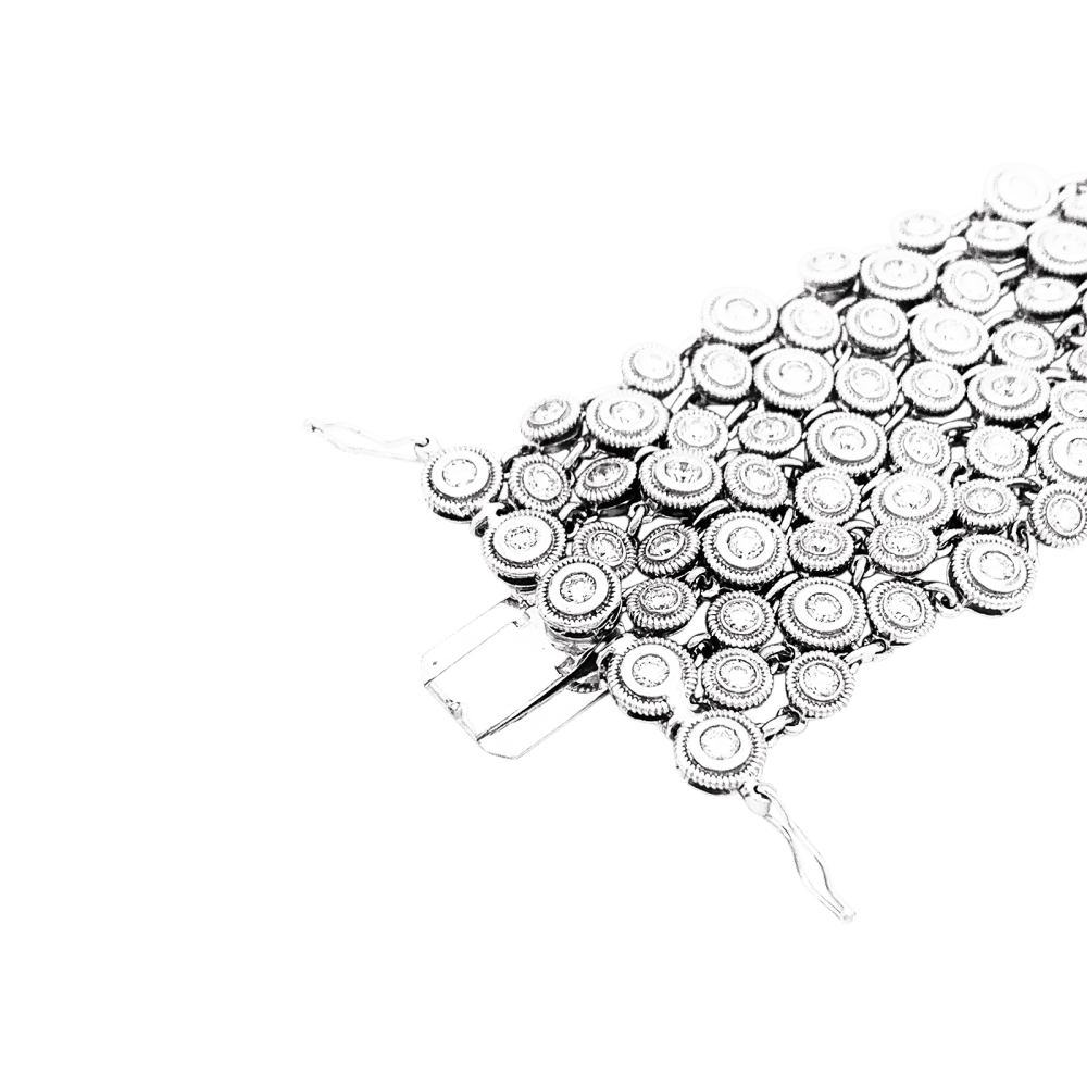 Bracelet souple, or blanc et diamants. 5