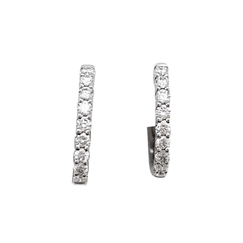 Paire de petites créoles en or blanc, diamants. 1