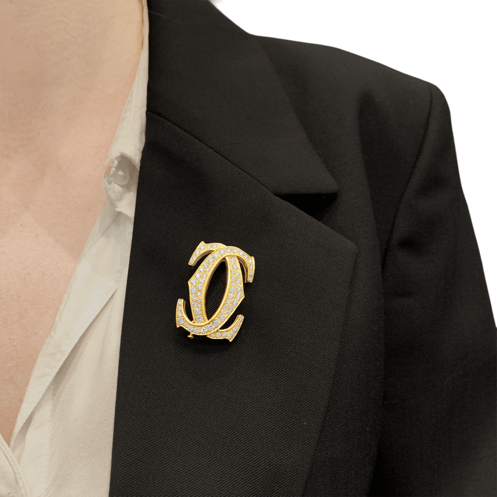Broche Cartier, "Double C", or jaune, diamants. 8