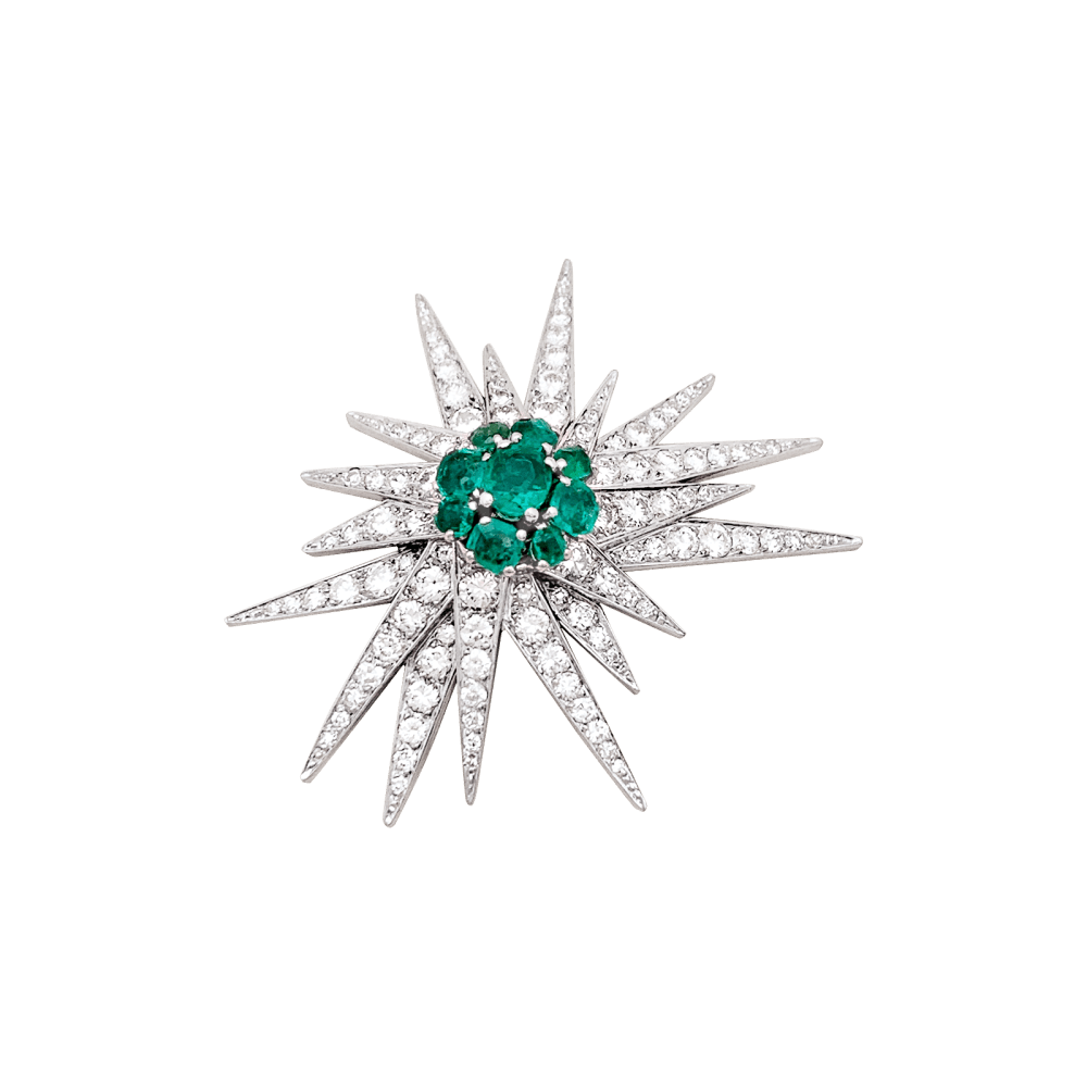 Broche "Étoile", or blanc, platine, émeraudes et diamants. 1