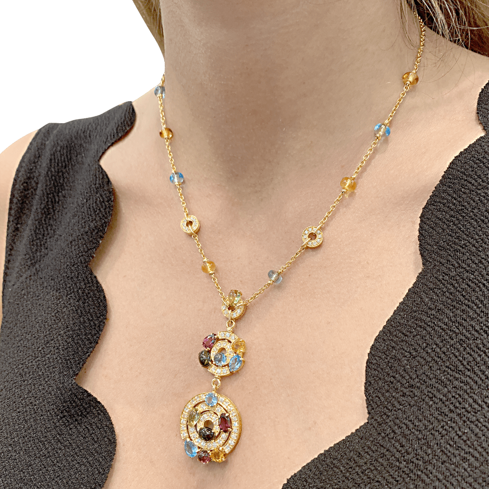 Collier BULGARI "Astrale", or jaune, diamants et pierres de couleur. 8