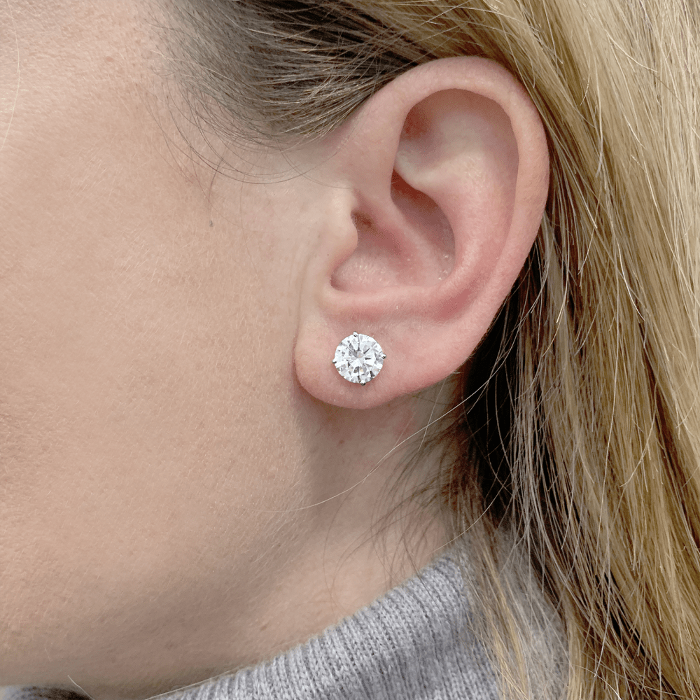 Puces d'oreilles diamants et or blanc. 7
