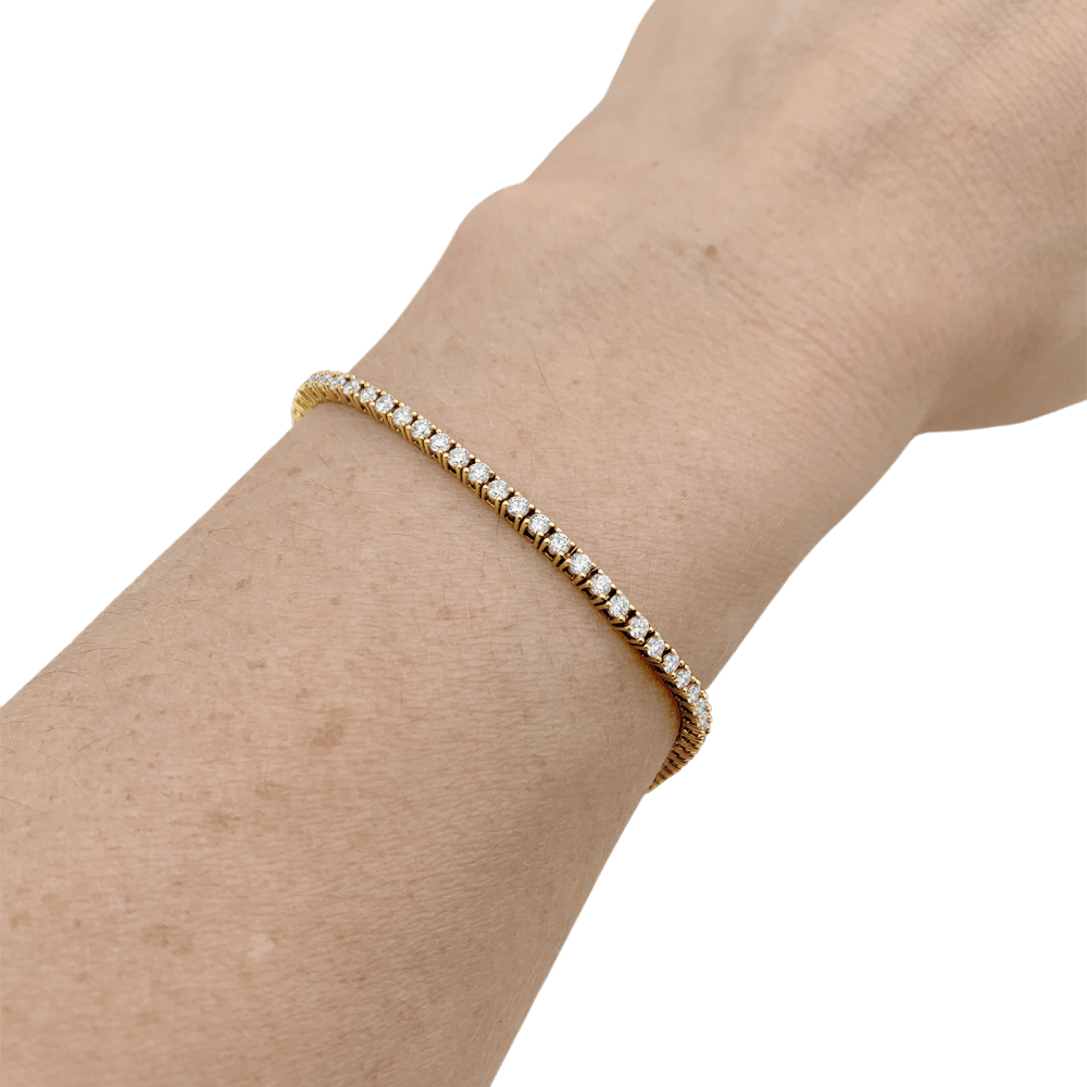 Bracelet ligne, or rose et diamants. 4