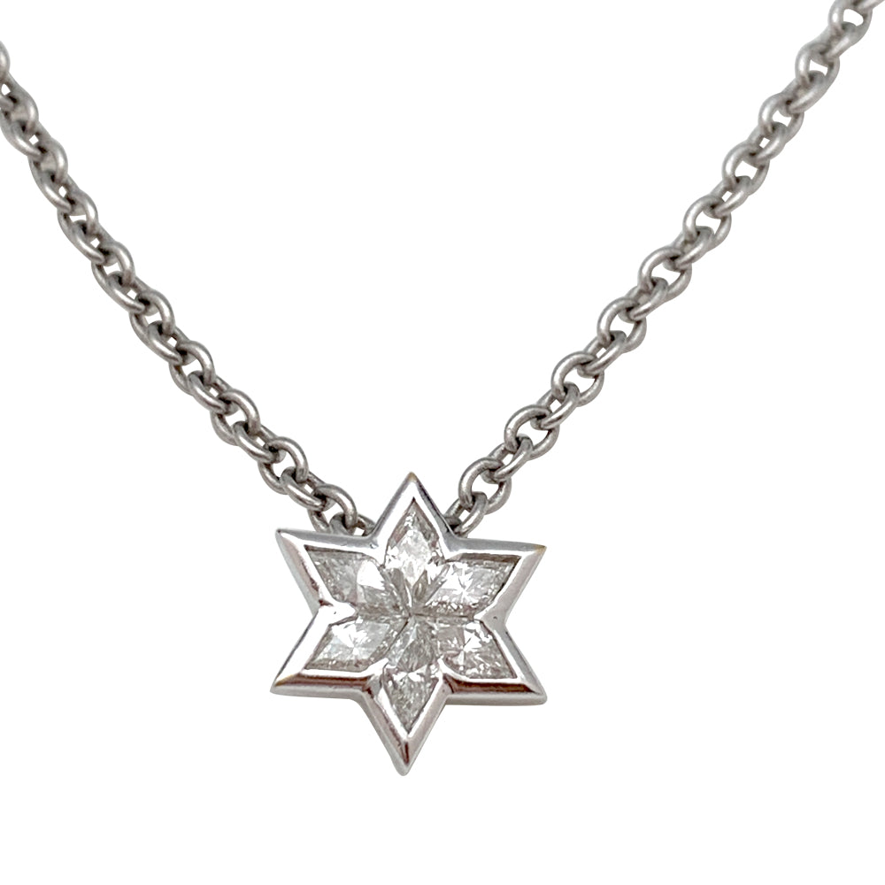 Pendentif en or blanc, étoile diamants. 2